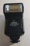 Camera Flash: Universal Shoe Mount Model 244. Fixed Price $12.00.