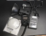 Quantum Qflash QF8C Trio Basic Shoe-mount For Canon Cameras. Fixed Price $90.00.