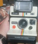 Polaroid Onestep 2351 Q-light Land Camera White Black Multi-color. Fixed Price $25.99.