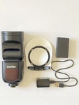 Godox V1 Canon Flash With Extra Battery. Fixed Price $185.00.