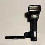 Nissin 4200GW Flash For Film Cameras And Bracket. Fixed Price $70.00.