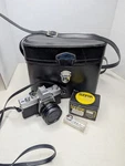 Minolta SRT-100 Slr Camera + 55MM F2 Lens Sunpak 120S Flash Hard Sided Case. Fixed Price $64.99.