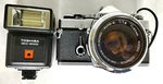 Near Mint Olympus OM-1 50MM F/1.8 Lens Toshiba QCC-2000 Flash Set #0105. Fixed Price $270.99.