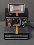 Polaroid Land Camera Instant Film One Step Plus Rainbow With Q-light 2351 Flash. Fixed Price $21.77.