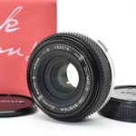 Mint Olympus System Zuiko Auto-s 40MM F2 Pancake Lens From Japan #260115. Fixed Price $799.99.