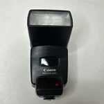 Canon Speedlite 420EX Shoe Mount Flash. Fixed Price $17.97.