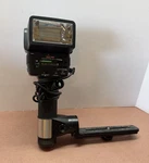 Sunpak Auto 555 Thyristor Handle Mount Strobe Flash Cold Shoe W/ Bracket Cable. Fixed Price $37.99.