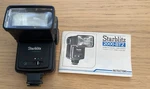 Starblitz 2000 Btz Japanese Electronic Photography Flash Unit & Booklet. Fixed Price $9.99.