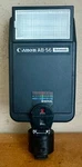 Canon AB-56 Automatic Speedlite Camera Shoe Mount Flash Unit W/vivitar SL-2. Fixed Price $29.00.