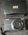 Nikon Coolpix S6100 16.0MP Black Compact Camera 7X Zoom. Fixed Price $110.00.