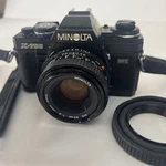 Minolta X-700 35MM Film Camera With 50MM F2 Lens Md Mount X700. Fixed Price $110.00.