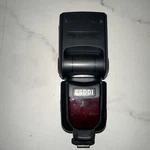 Esddi Camera Flash Speedlite. Fixed Price $14.99.