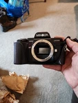 7000 Slr 35MM Camera Black W/ Minolta. 50MM F/1.7 /milisi Elec.flash. Fixed Price $17.48.