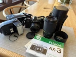 Fujica AX-3 Camera Body W/ 50MM 1.6 & 70-140MM Mitakon Zoom Zykkor 300FLASH. Fixed Price $149.99.