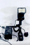 Sunpak 622 Super Pro Handle Mount Flash System Setup For Canon Film Cameras. Fixed Price $100.00.