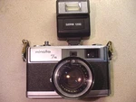 Minolta Hi-matic 7S Camera W/ Rokkor-pf 45MM Sears 55MM Lenses Sunpak 120C Flash. Fixed Price $95.00.