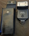 New Minolta 132X Electroflash Shoe Mount Photo Camera Bounce Automatic. Fixed Price $50.00.