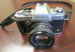 Full Cla Yashica FX-103 Slr, Zeiss T* 50MM F/1.7 Lens, New Skin, Light Seals. Fixed Price $299.50.
