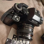 Ricoh KR-30SP Slr Camera, Sigma Zoom-master F =35 70MM, Xr Speedlite 300P. Fixed Price $123.00.
