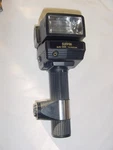 Sunpak Auto 555 Thyristor Handle Mount Flash. Fixed Price $42.00.