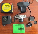 Fujica ST605 With 2X Lens And Sunpak Auto 421. Fixed Price $38.00.