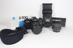 Minolta X-700 Film Slr Camera & Makinon 135MM Lens With Promura Fd 900TT Flash. Fixed Price $139.99.