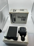 Vintage Rollei E19C Electronic Flash Unit With Charger & Sync Cable. Fixed Price $49.99.