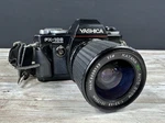 Yashica FX-103 Program 35MM Film Slr Camera W/ 75MM Katana Lens. Fixed Price $74.99.