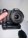 Nikon Coolpix Digital Camera + MB-E5700 Grip, Filters, Accessories Untested. Fixed Price $65.71.