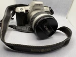 Minolta Maxxum Xtsi 35MM Slr Film Camera With Two Lens And Flash. Fixed Price $100.00.