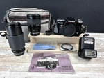 Yashica Fx 103 Program Red Line Kyocera Camera Bundle W/ Lenses & Accessories. Fixed Price $80.00.
