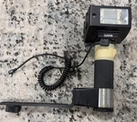 Vintage Sunpak Auto 511 Handle Mount Camera Flash W/ Bracket & Sync Cord. Fixed Price $31.99.