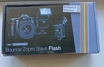 Vivitar SF-4000 Auto Bounce Zoom Slave Flash With Bracket. Fixed Price $18.99.
