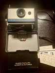 Vintage Polaroid Automatic 210 Land Camera (produced 1967 1969). Fixed Price $129.00.