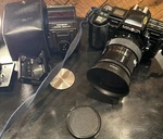 Minolta Maxxum 35MM 7000 W/ 2800 Af Flash & 28-85 Lens. Fixed Price $47.73.