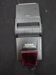 Sigma EF-500 Dg Super With Case. Fixed Price $30.00.