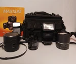 Minolta Maxxum Camera Accessories Bundle- Flashes, Lens, Viewer, Bag. Fixed Price $175.00.