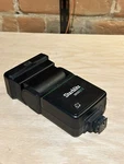 Flash Attachment, Starblitz (used Canon AE-1 Camera); Is. Fixed Price $10.94.