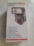Metz 40 AF-4C Power Zoom Flash For Canon Eos Cameras. Fixed Price $99.99.